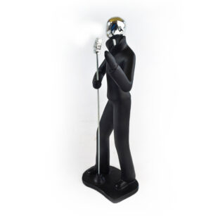sculpture of man holding a mic